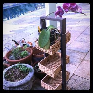 4 Tier rattan stand .